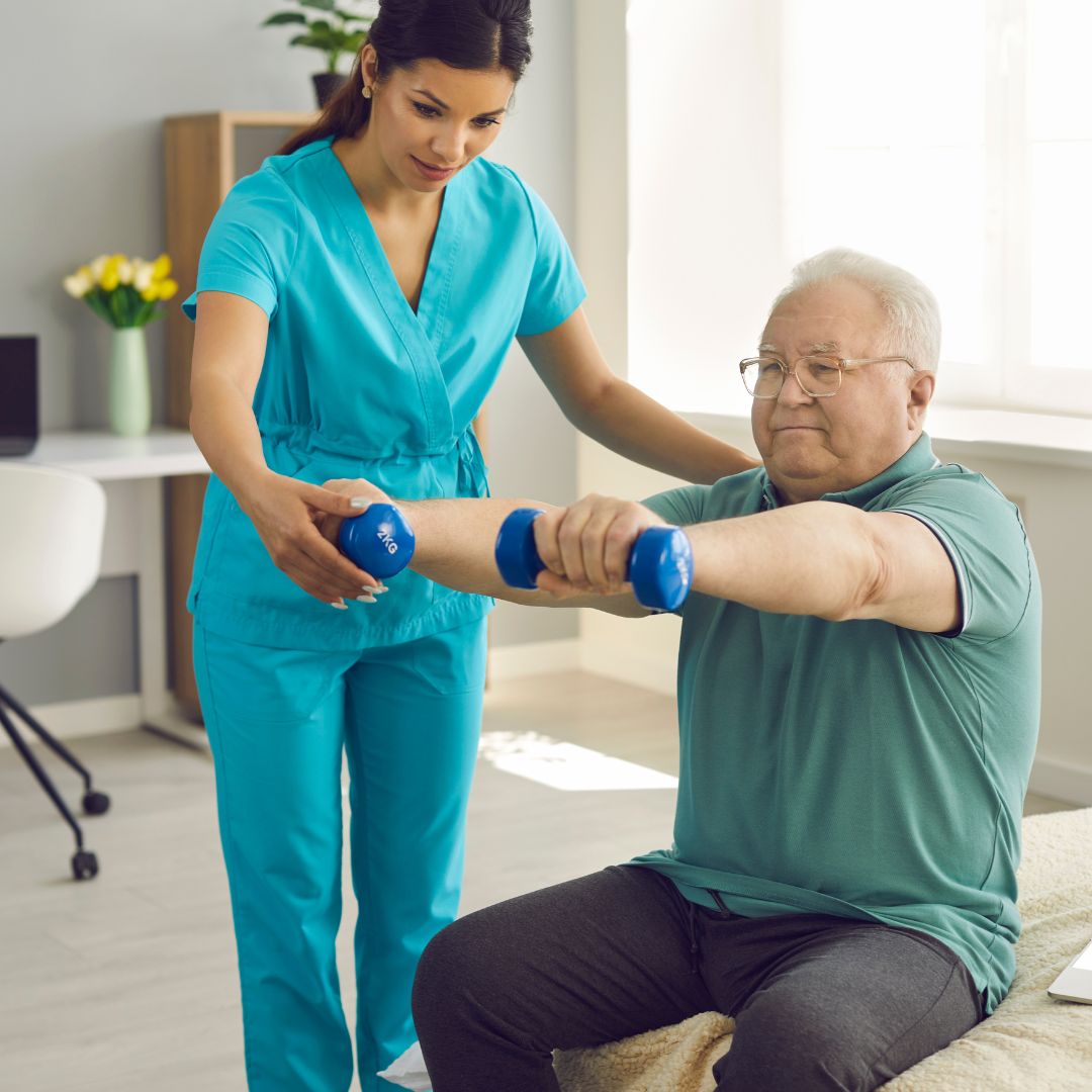 A registered nurse reviewing a care plan with a family at home